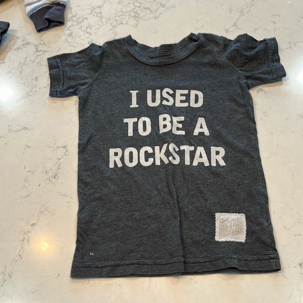 Retro brand fun tee. Mild washwear, soft. No other noted flaws